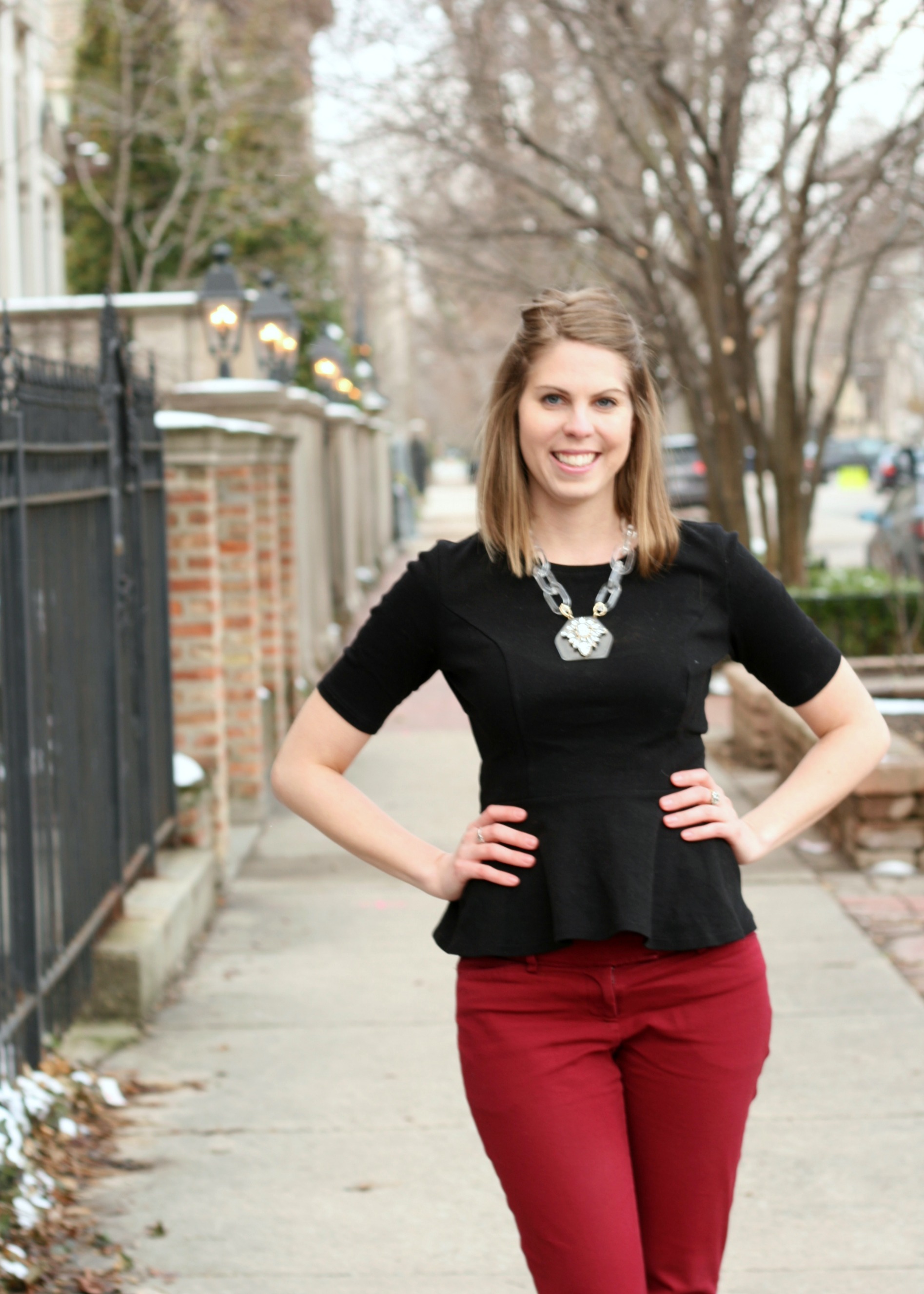 peplum top with statement necklace