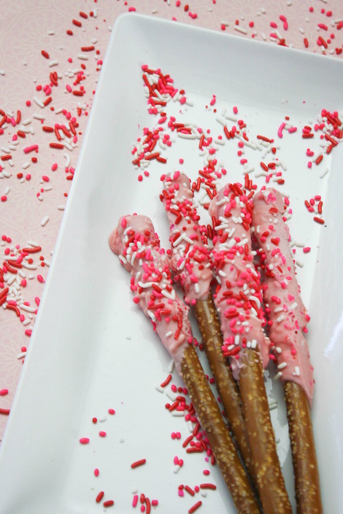 Chocolate dipped pretzels are such a fun Valentine's Day treat. There are so many ways to decorate and the end result is a decadent sweet and salty snack that everyone loves - especially the kiddos.