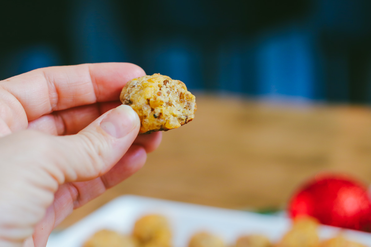 My sausage balls recipe made with Bisquick, pork sausage and cheddar is a favorite holiday appetizer and a big hit with guests. They continue to be one of my most-requested holiday recipes! Serve sausage balls at your next holiday party.