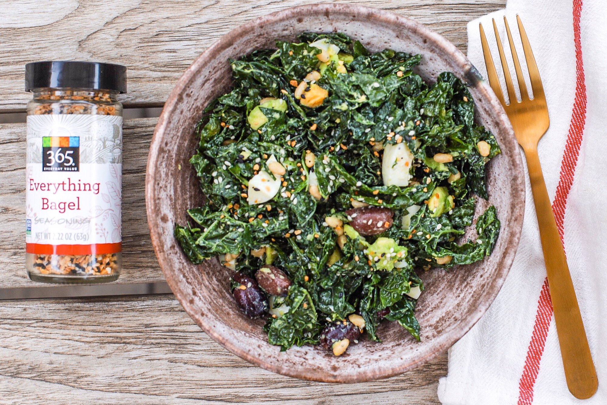 The best avocado kale salad ever!! The avocado, lemon, pine nuts and EVERYTHING Bagel Seasoning take it to the next level. I promise this will be your new favorite salad!