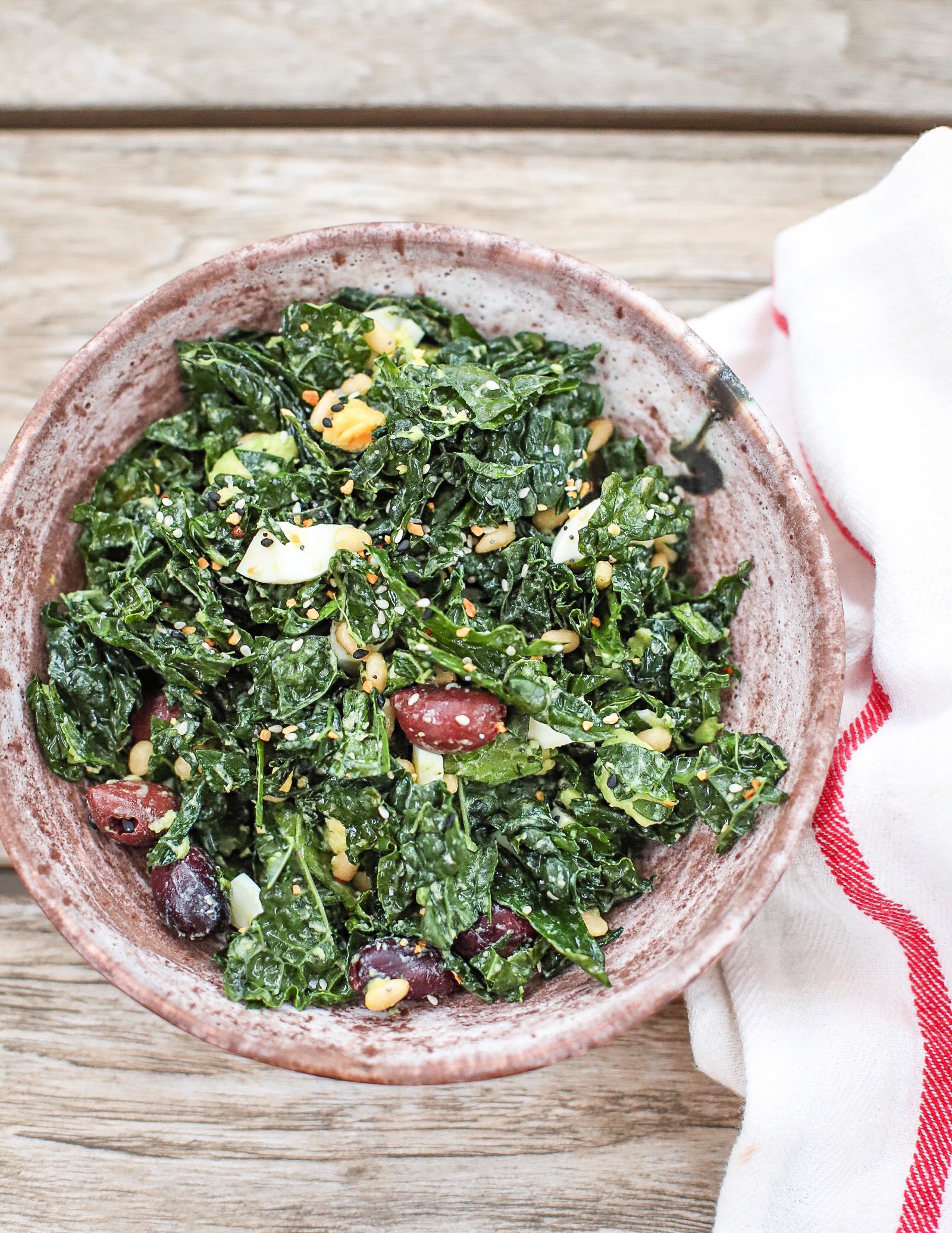 The best avocado kale salad ever!! The avocado, lemon, pine nuts and EVERYTHING Bagel Seasoning take it to the next level. I promise this will be your new favorite salad!